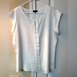 White sleeveless blouse